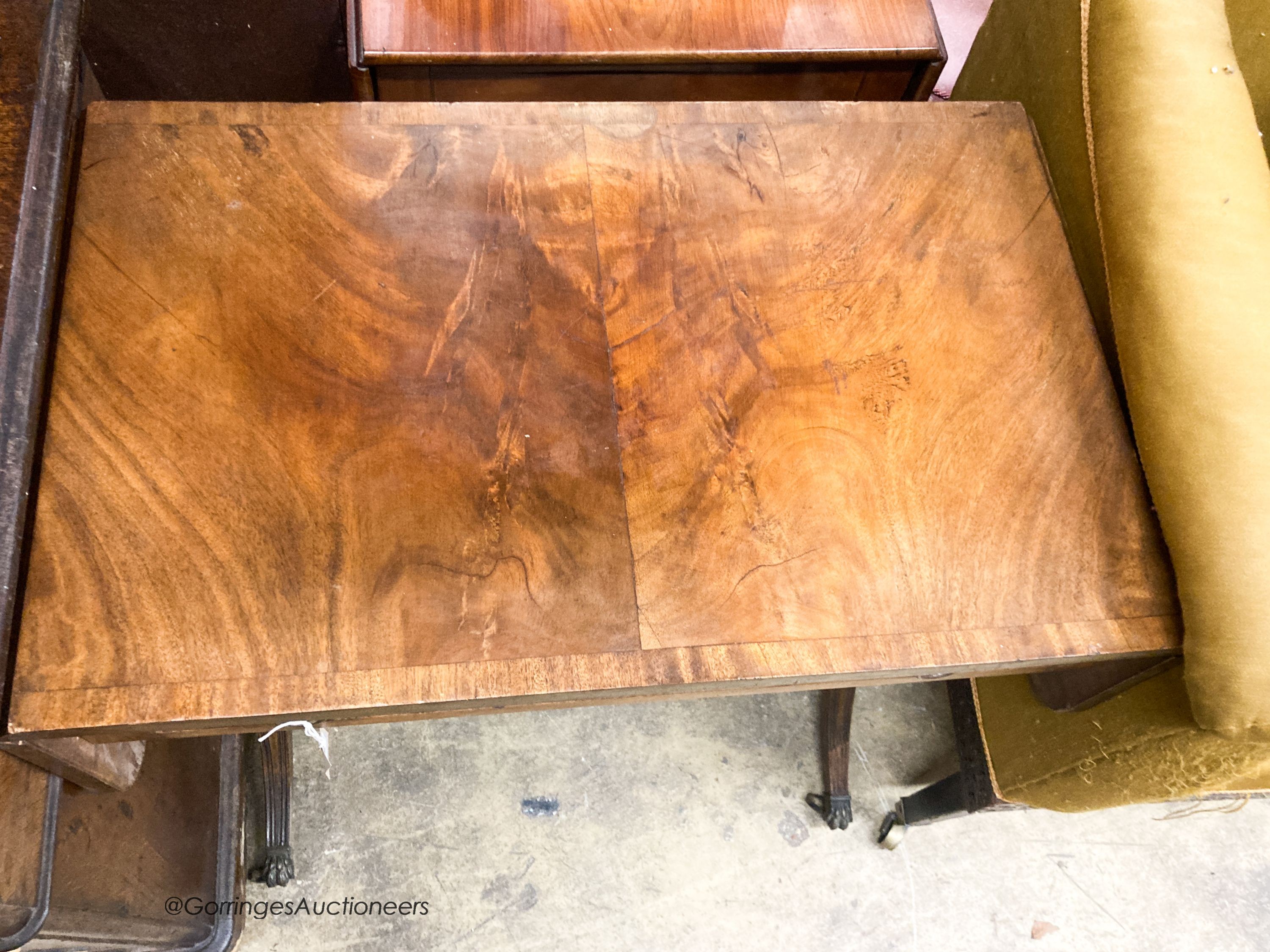 A 1920's reproduction mahogany sofa table, W.74cm H.47cm H.73cm
